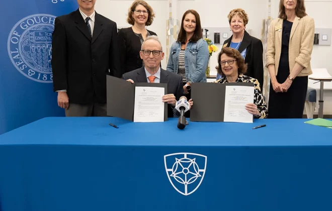 NDMU President Marylou Yam and Goucher College President Kent Devereaux participate in a ceremonial signing of the joint agreement on Friday, September 13 at 10 a.m. on NDMU’s campus in the University Academic Building’s Center for Caring with Technology.
