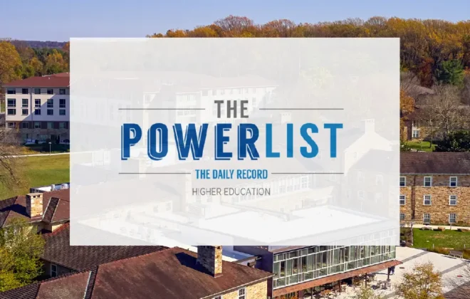 An illustration featuring the Goucher College campus with the Power List from the Daily Record Higher Education logo.