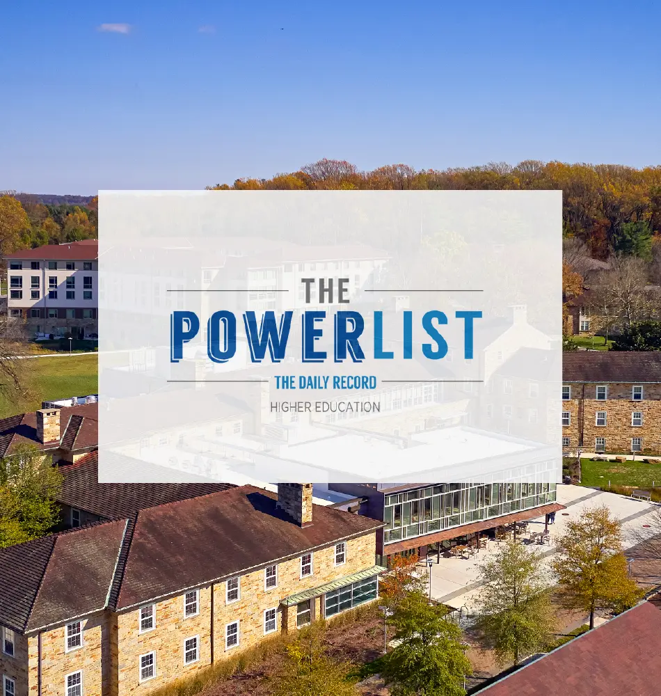An illustration featuring the Goucher College campus with the Power List from the Daily Record Higher Education logo.